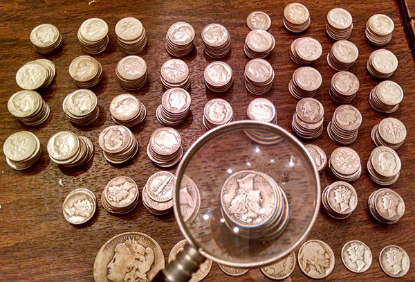 magnified dimes old silver
